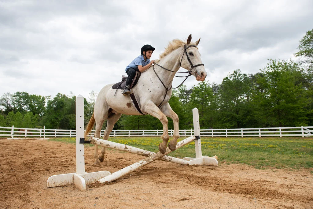 Keswick student riding a horse