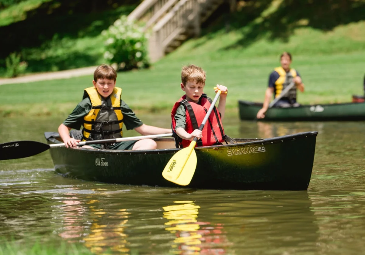 students in a canoe