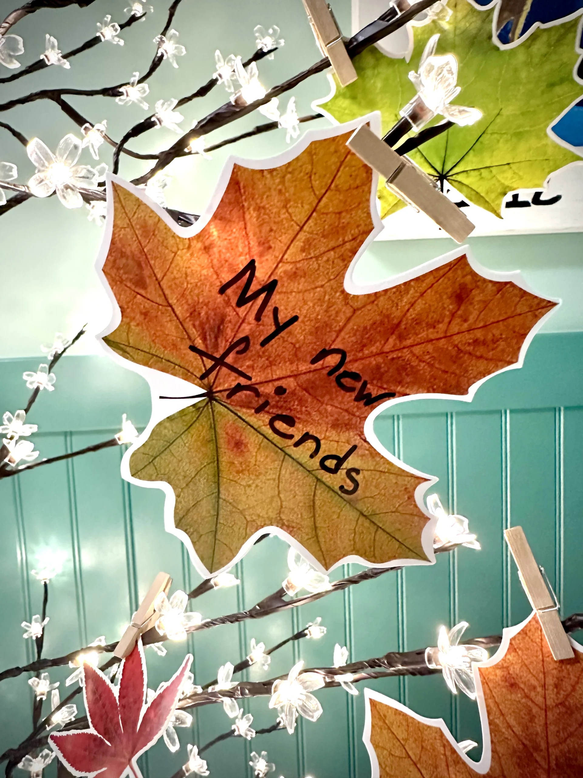 Gratitude Tree with leaves displaying messages of gratitude.