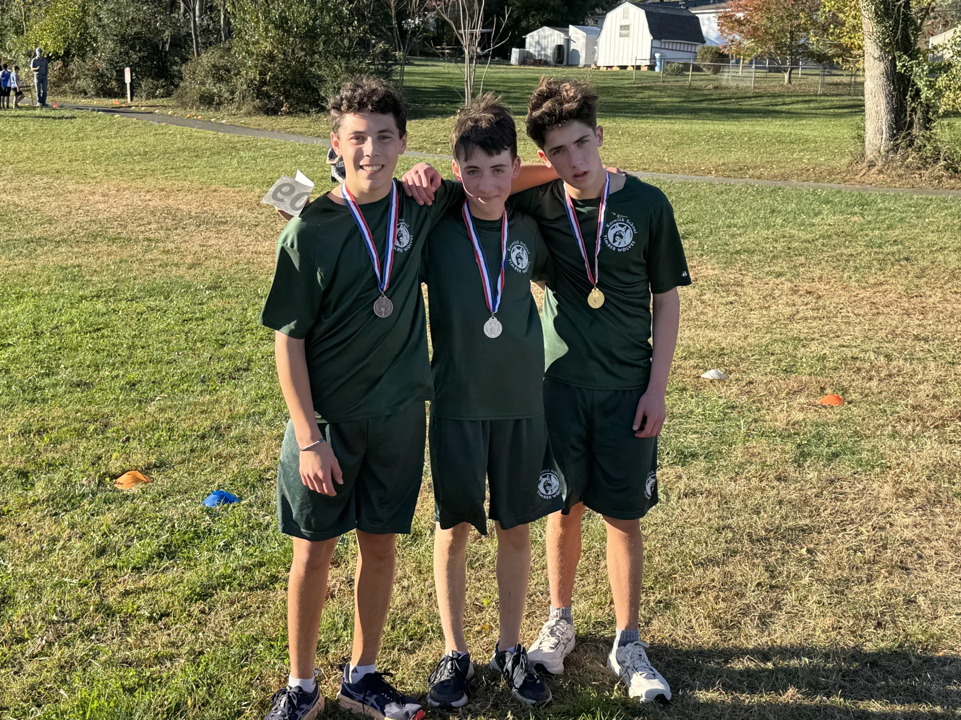 Three students at cross country meet