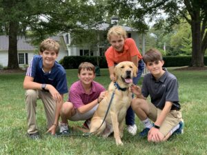 Students with Therapy Dog through Animal Therapy Support